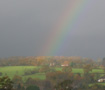 blurred rainbow across the valley on a dark November afternoon.