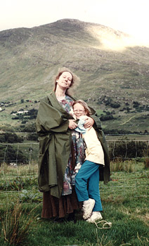 Mother and daughter hugging on the road near the Ballaghbeama Gap in County Kerry, Ireland.